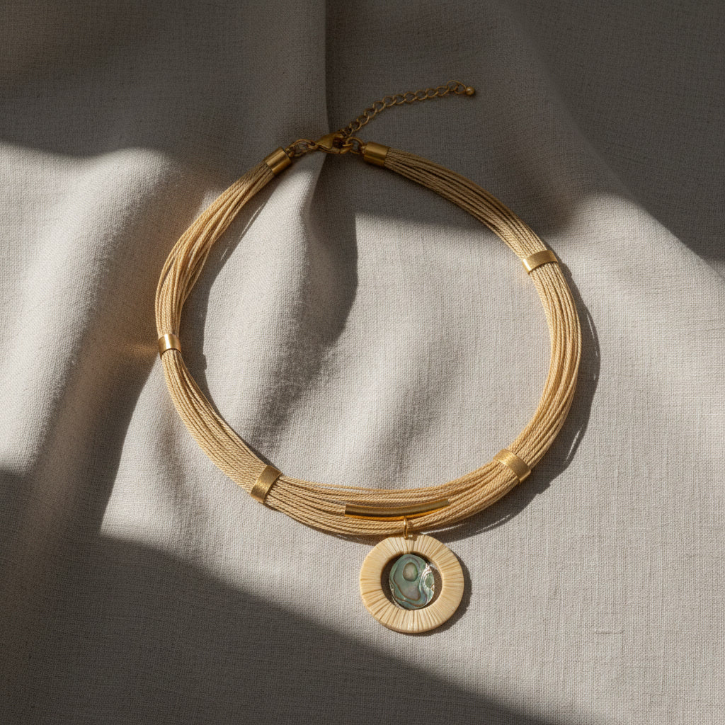 sustainable luxury jewelry handcrafted with natural fibers and mother of pearl