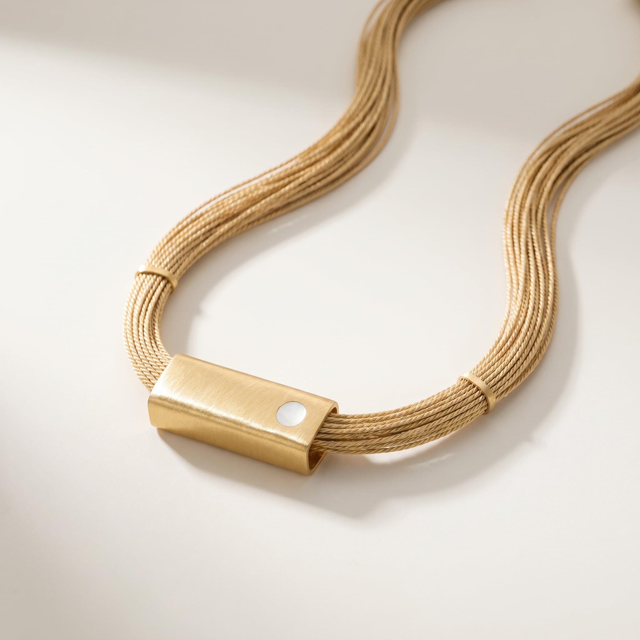 Purplee Store Buriti Geometric Orvellia Necklace with a clasp on a light background