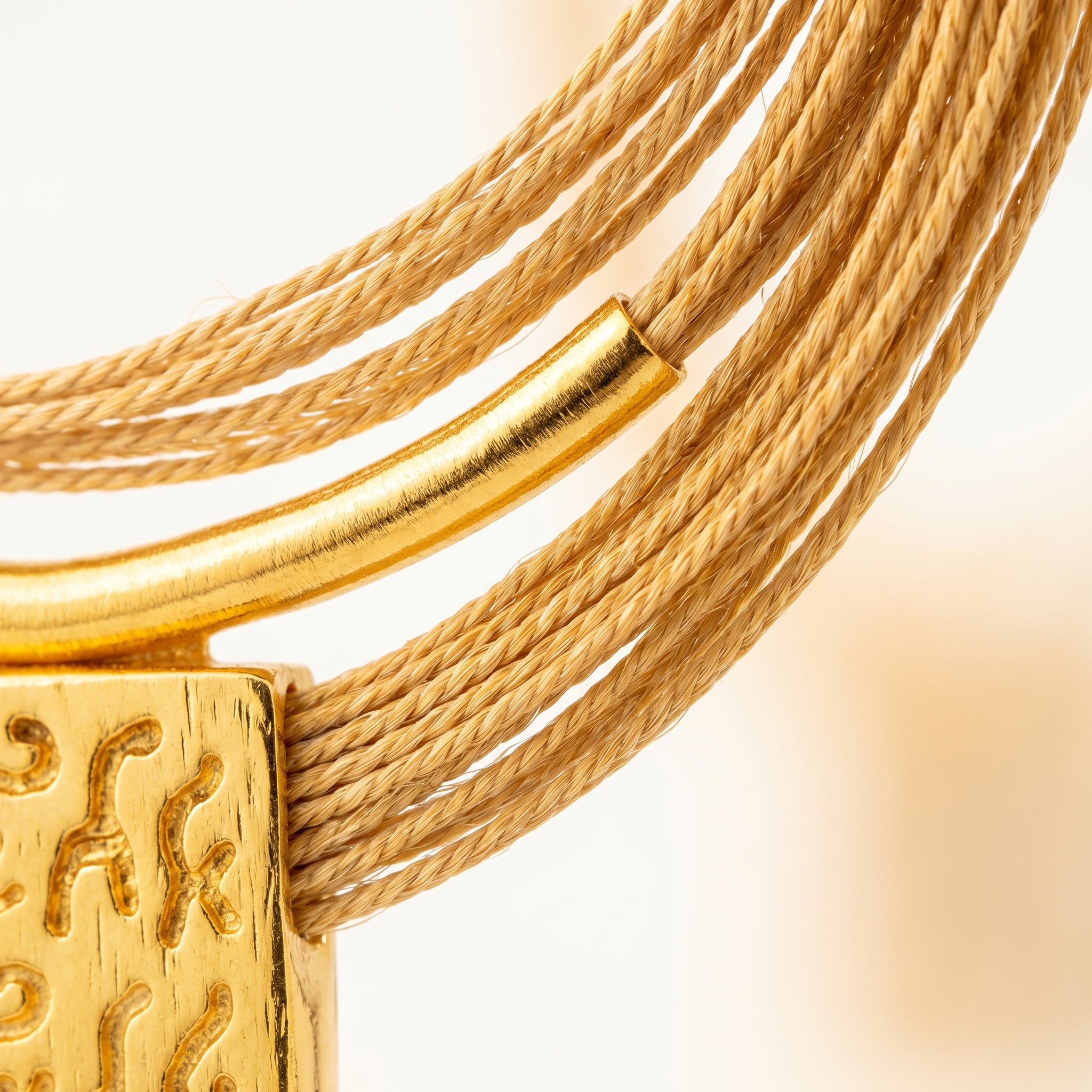 Close-up on a Buriti Statement Solari Necklace with intricate design on a light background-Purplee Store