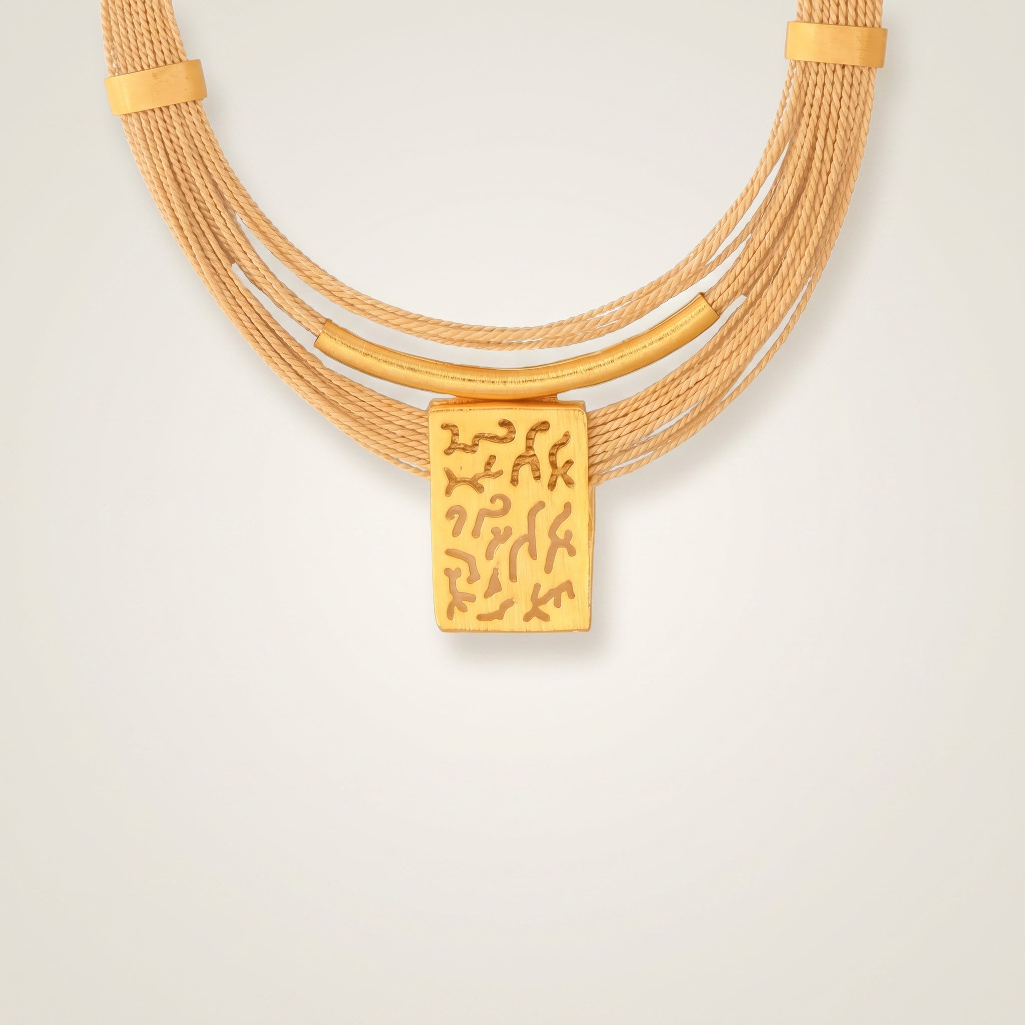 Purplee Store Buriti Statement Solari Necklace on a light beige background