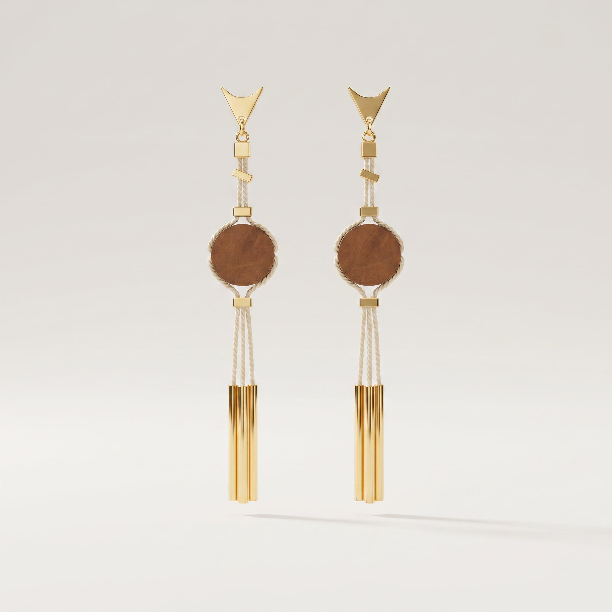 Pair of  Purplee Store Buriti Amira Earrings with wooden accents on a light gray background