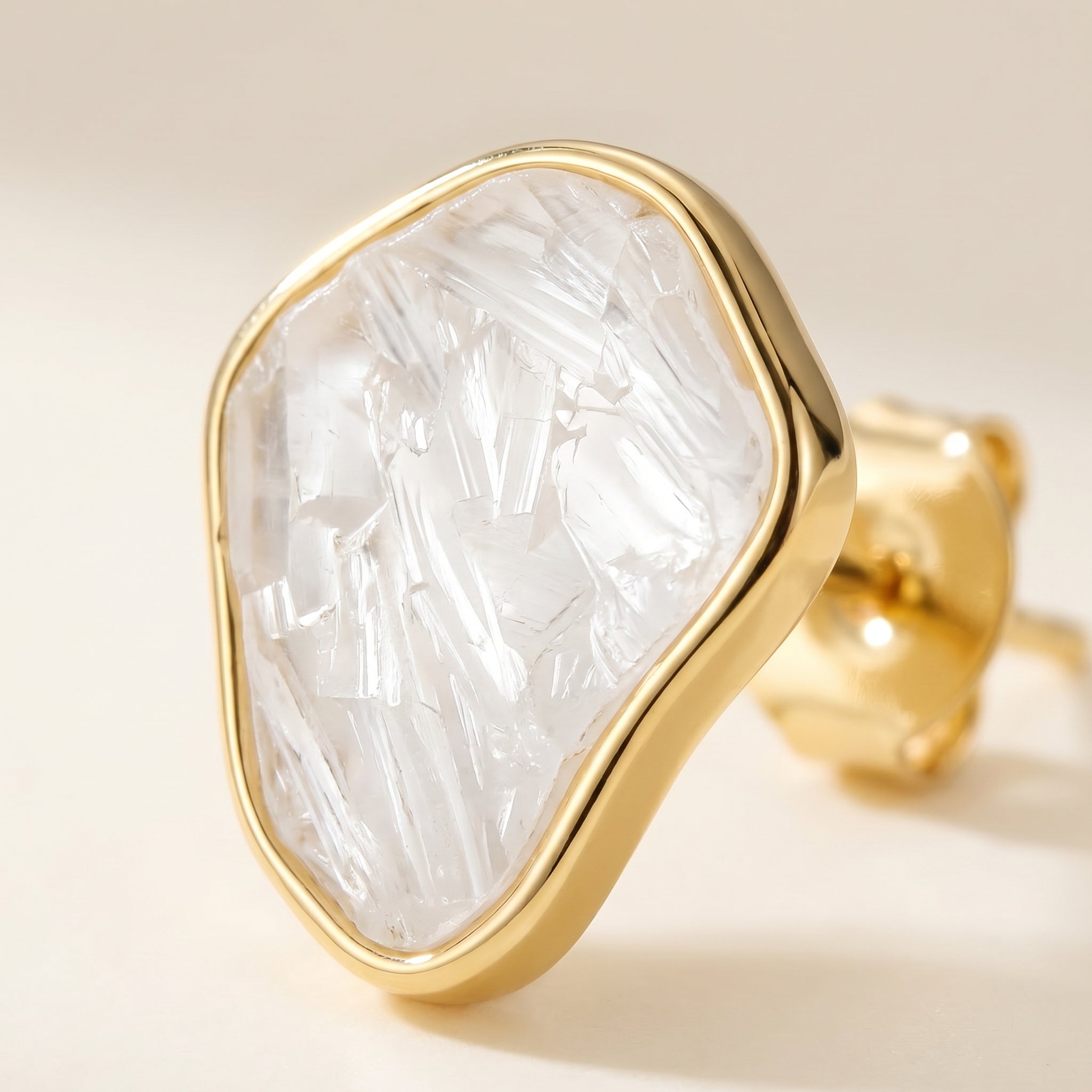 Close-up a Purplee Store Earthly Opulence Sublime Gemstone Studs  on a beige background