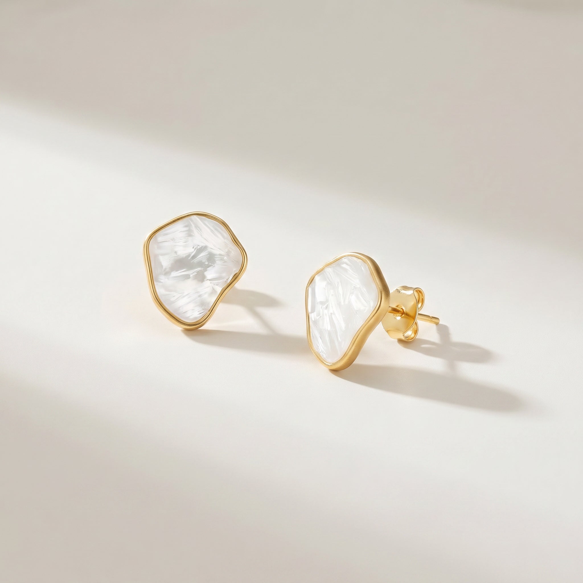 Purplee Store Earthly Opulence Sublime Gemstone Studs on a light beige background