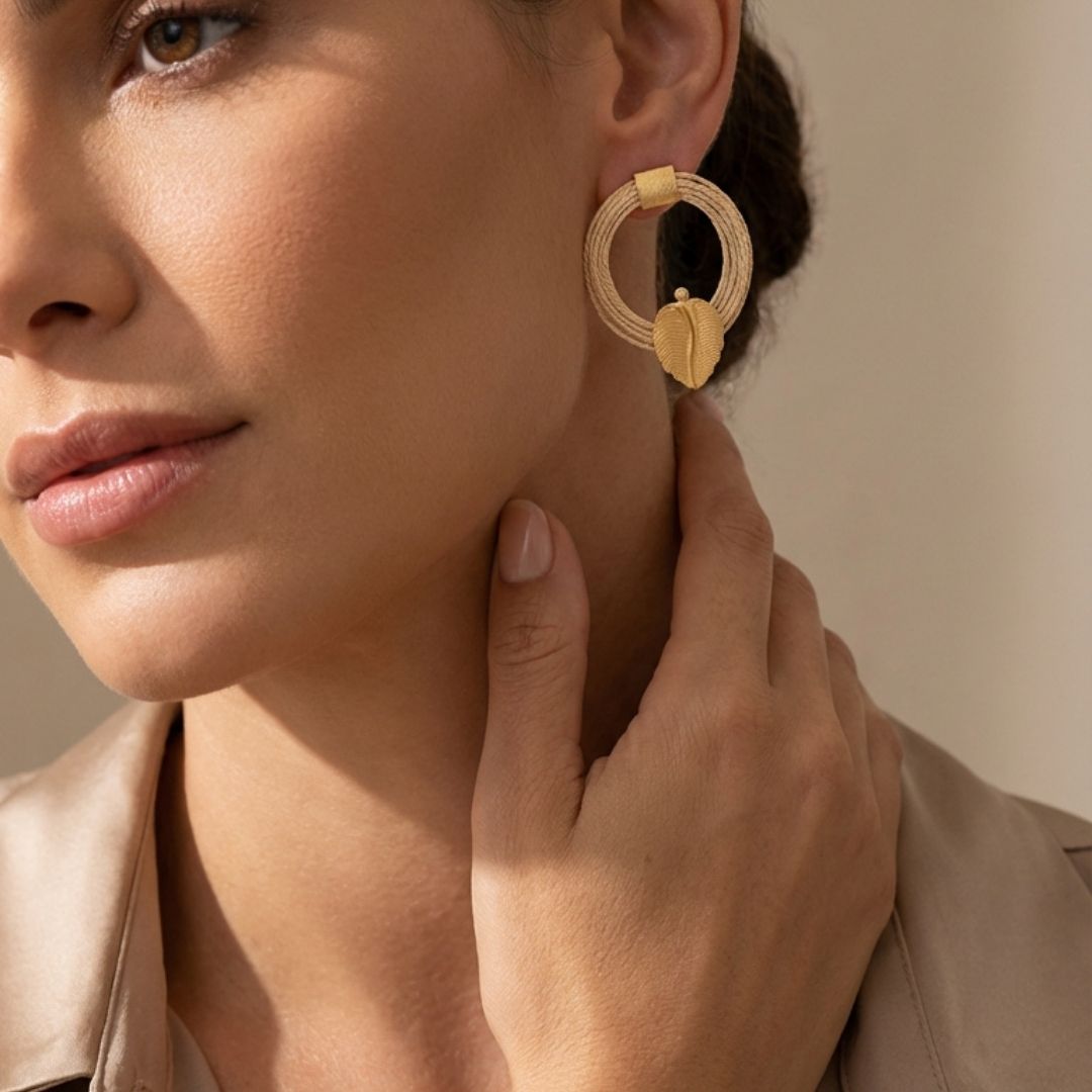 Elegant  woman using a Zariel Earrings with natural texture and artisanal finish | Purplee Store