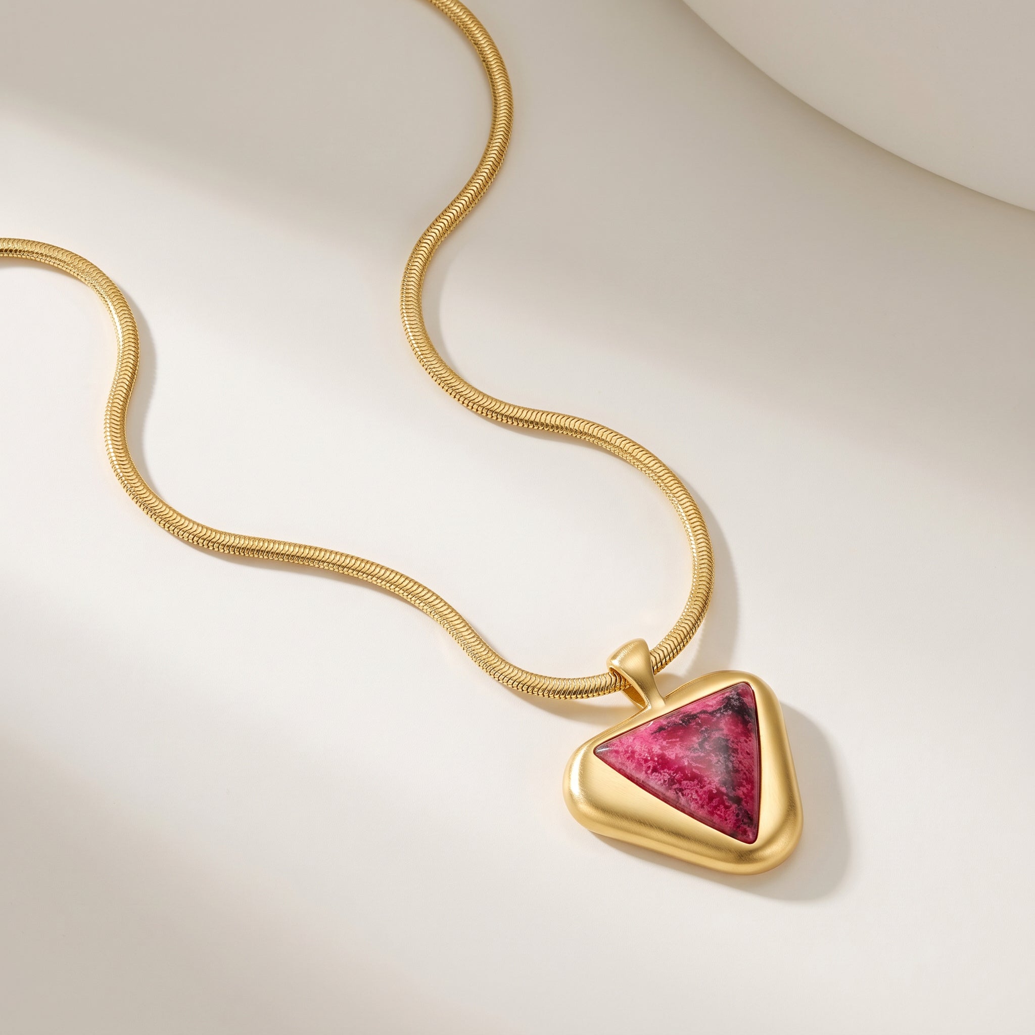 Purplee Store ICON Eclipse Luxury Rhodonite Pendant Necklace on a light background