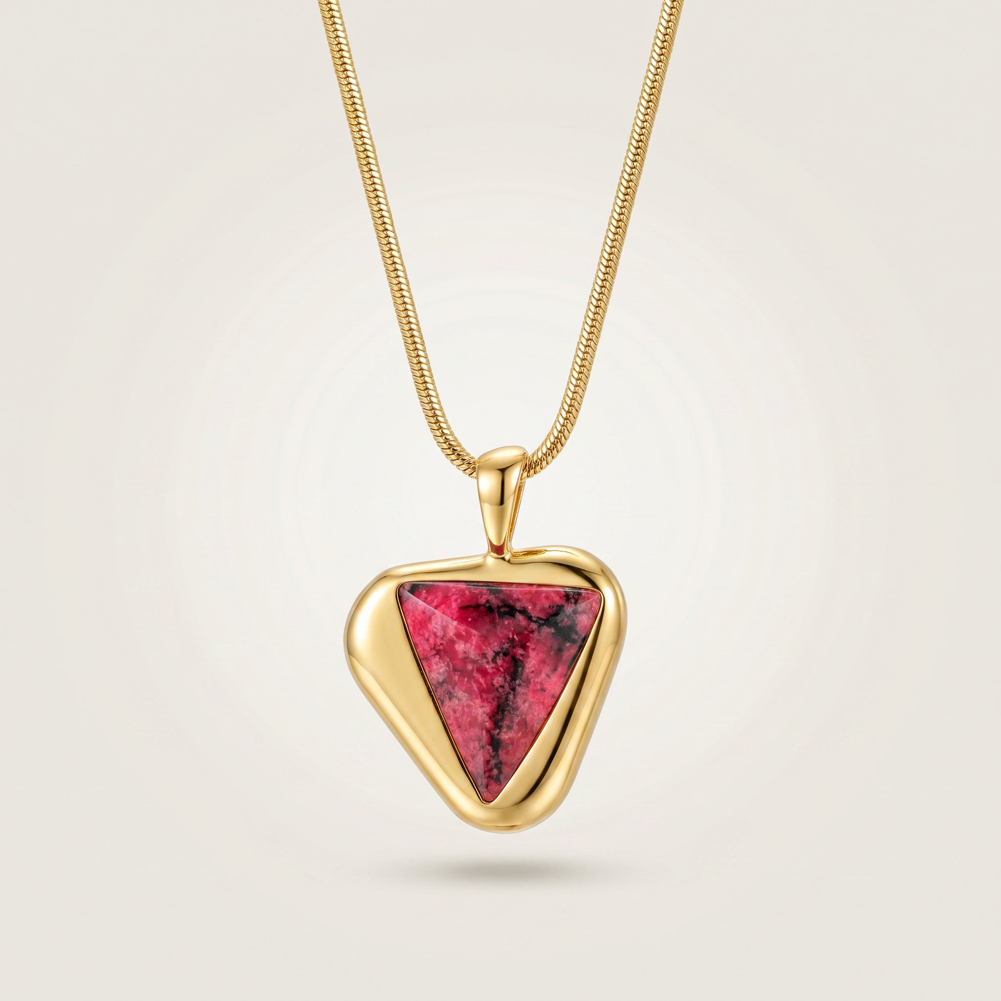 Purplee Store ICON Eclipse Luxury Rhodonite Pendant Necklace on a light beige background