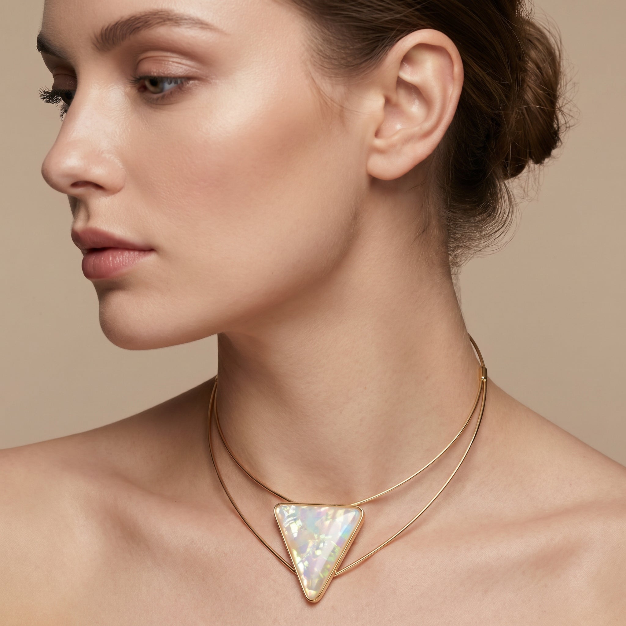 Woman wearing a Purplee Store ICON Opal Statement Chockeron a beige background