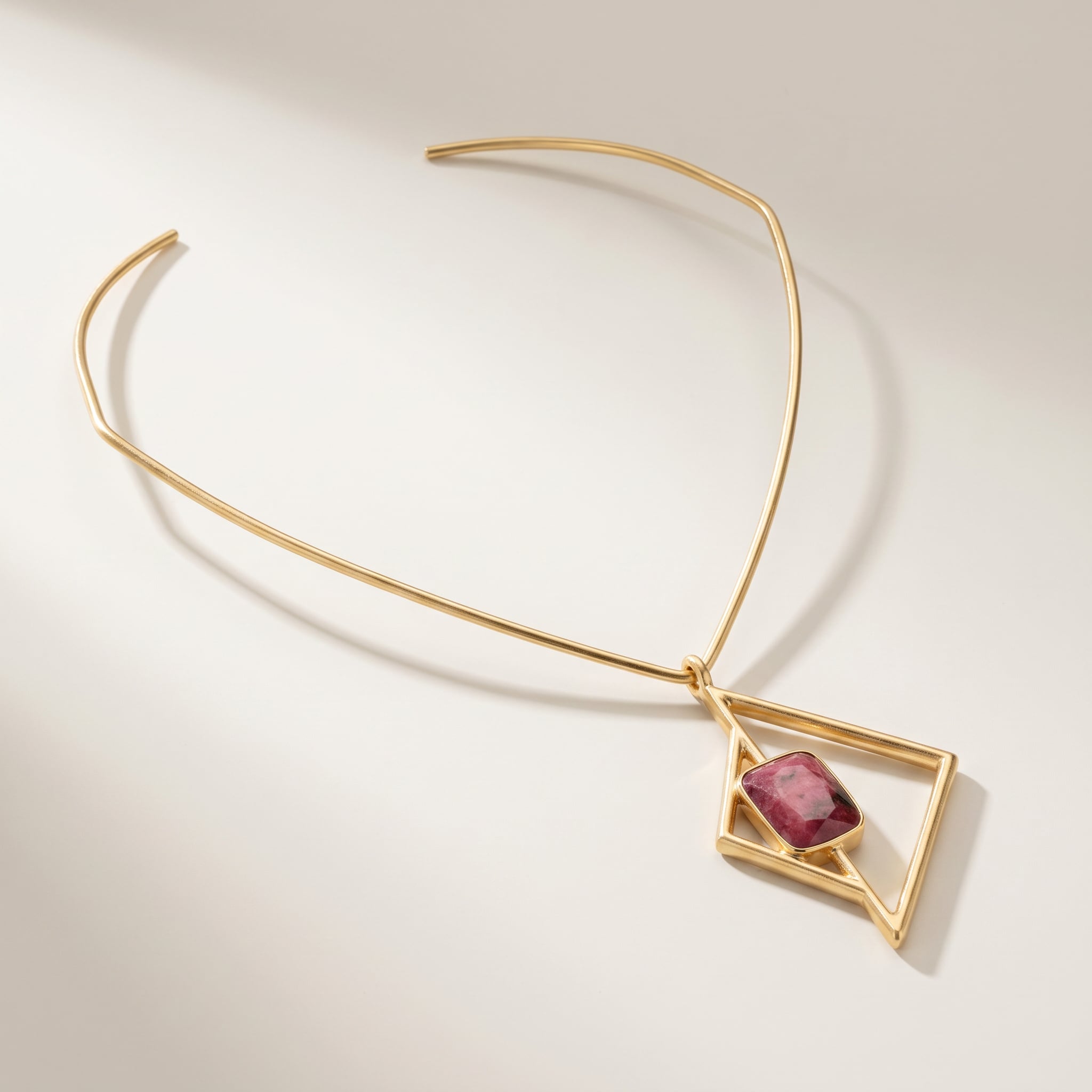 Purplee Store ICON Vertex Rhodonite Chocker on a light background