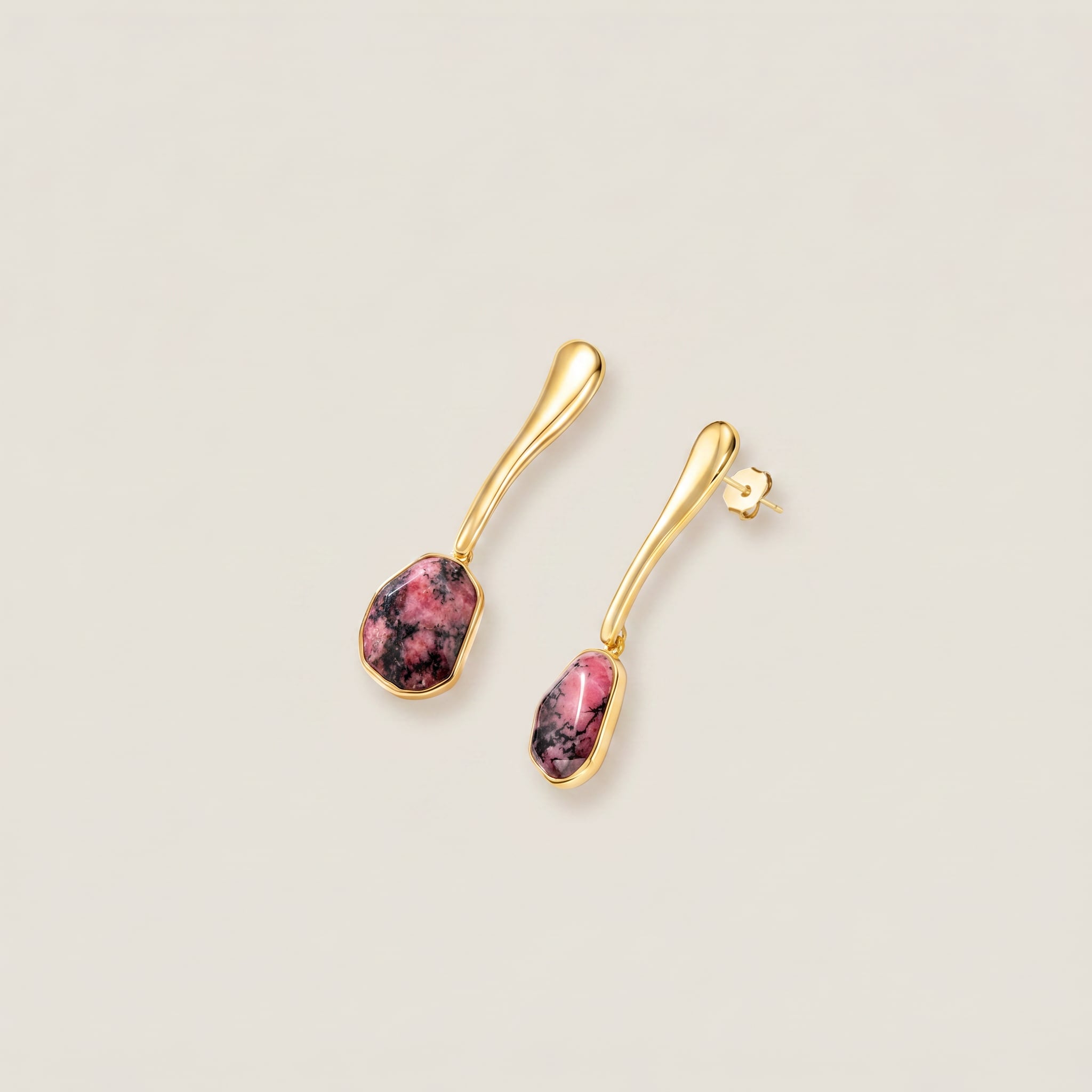 Purplee Store ICON Rhodonite Sculptural Earrings on a beige background