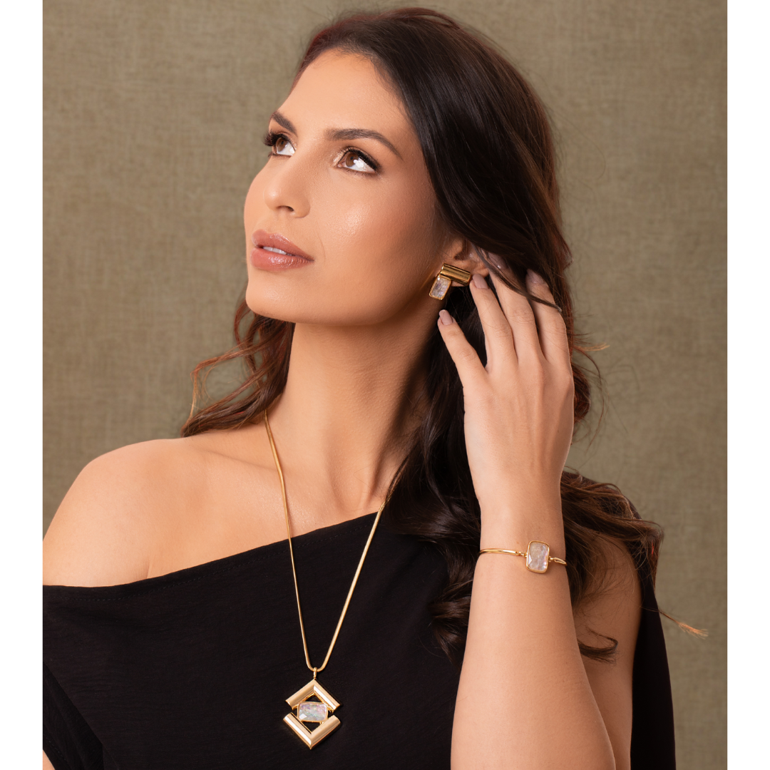 Model using an ICON Prism SET in 18k Gold & Opal of the Sea Purplee Store