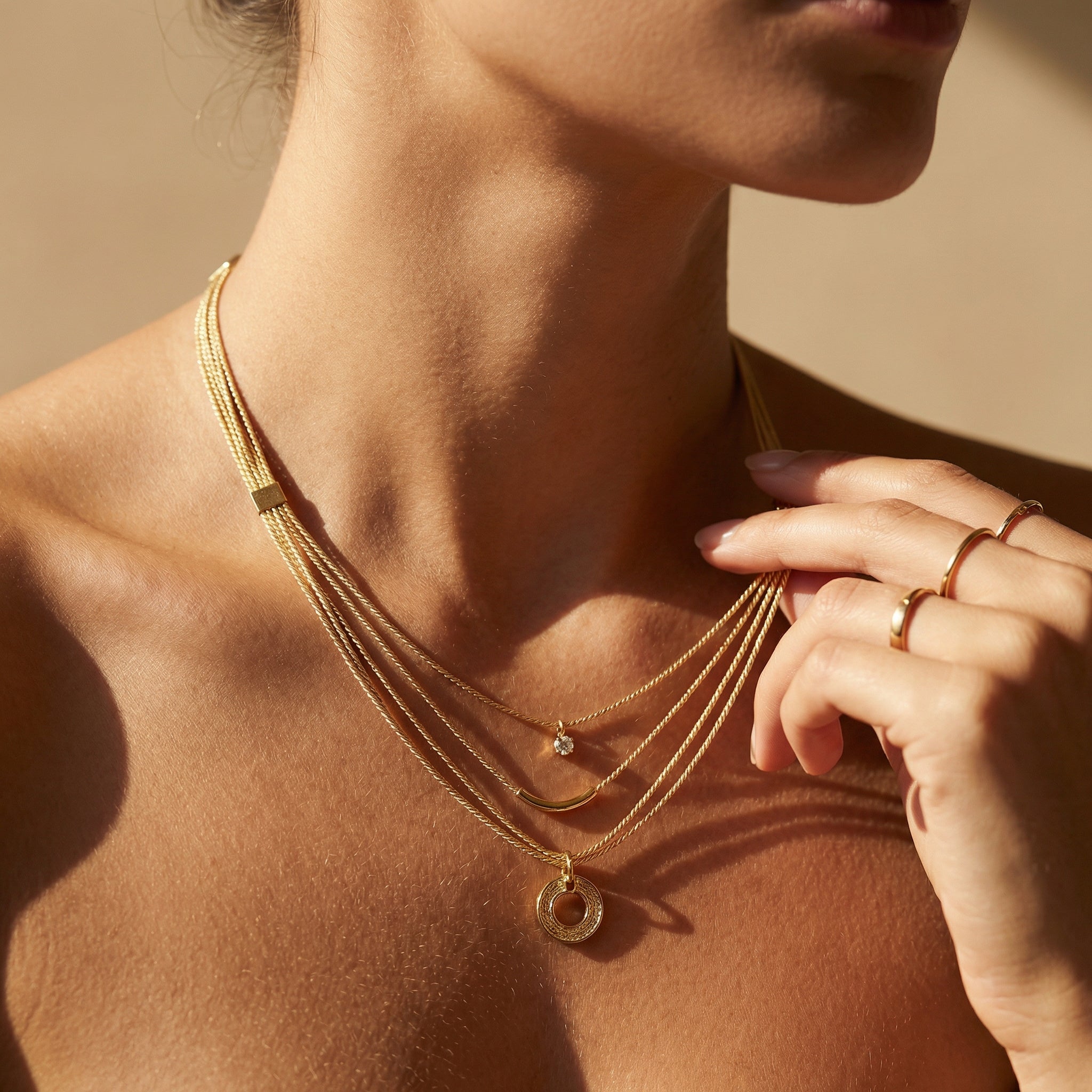 Close-up of a woman wearing Nireya: Buriti Fiber Statement Necklace & Chrysoprase with a neutral background. Purplee Store