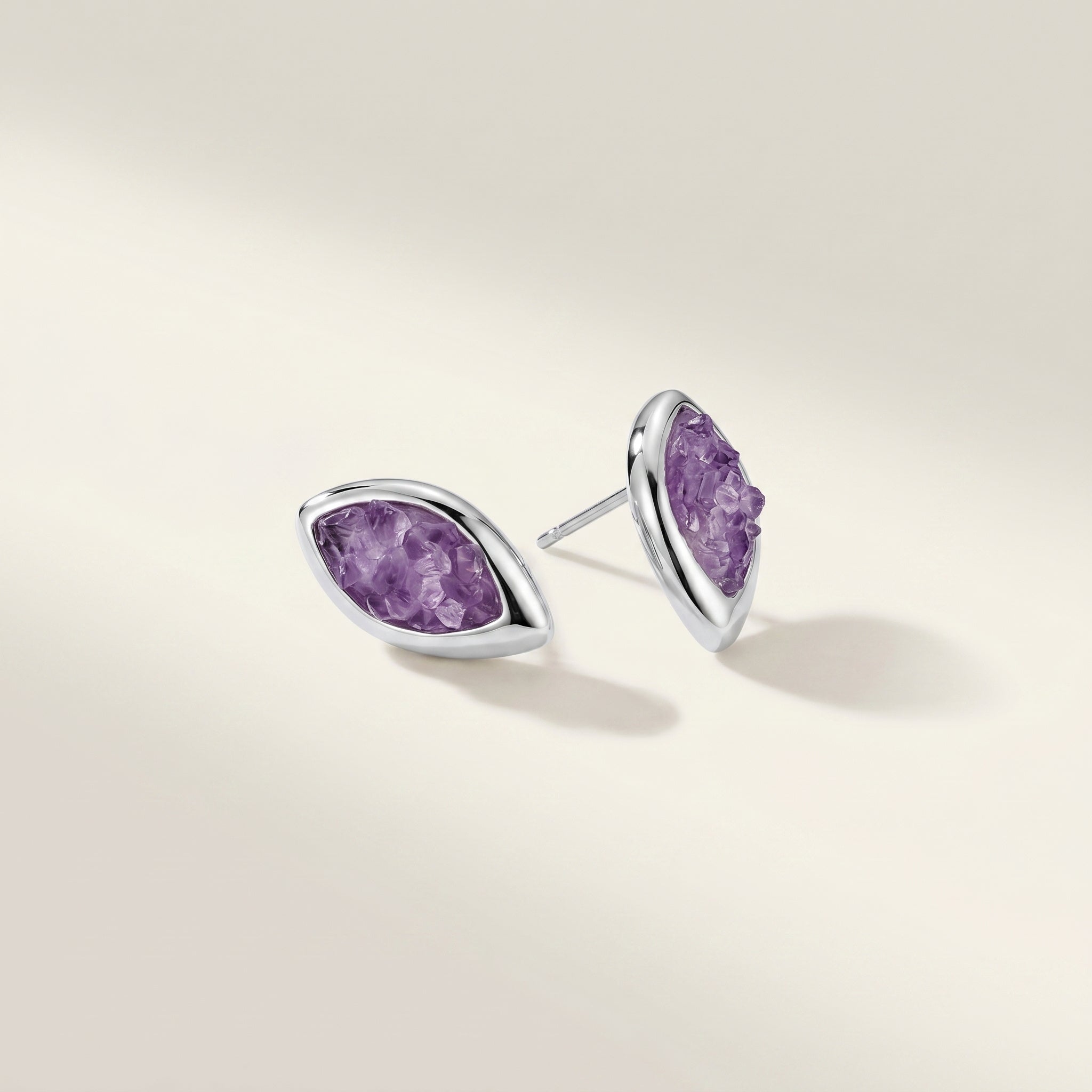 Pair of PIORELLE Amethyst Birthstone Earrings on a light beige background| Purplee Store