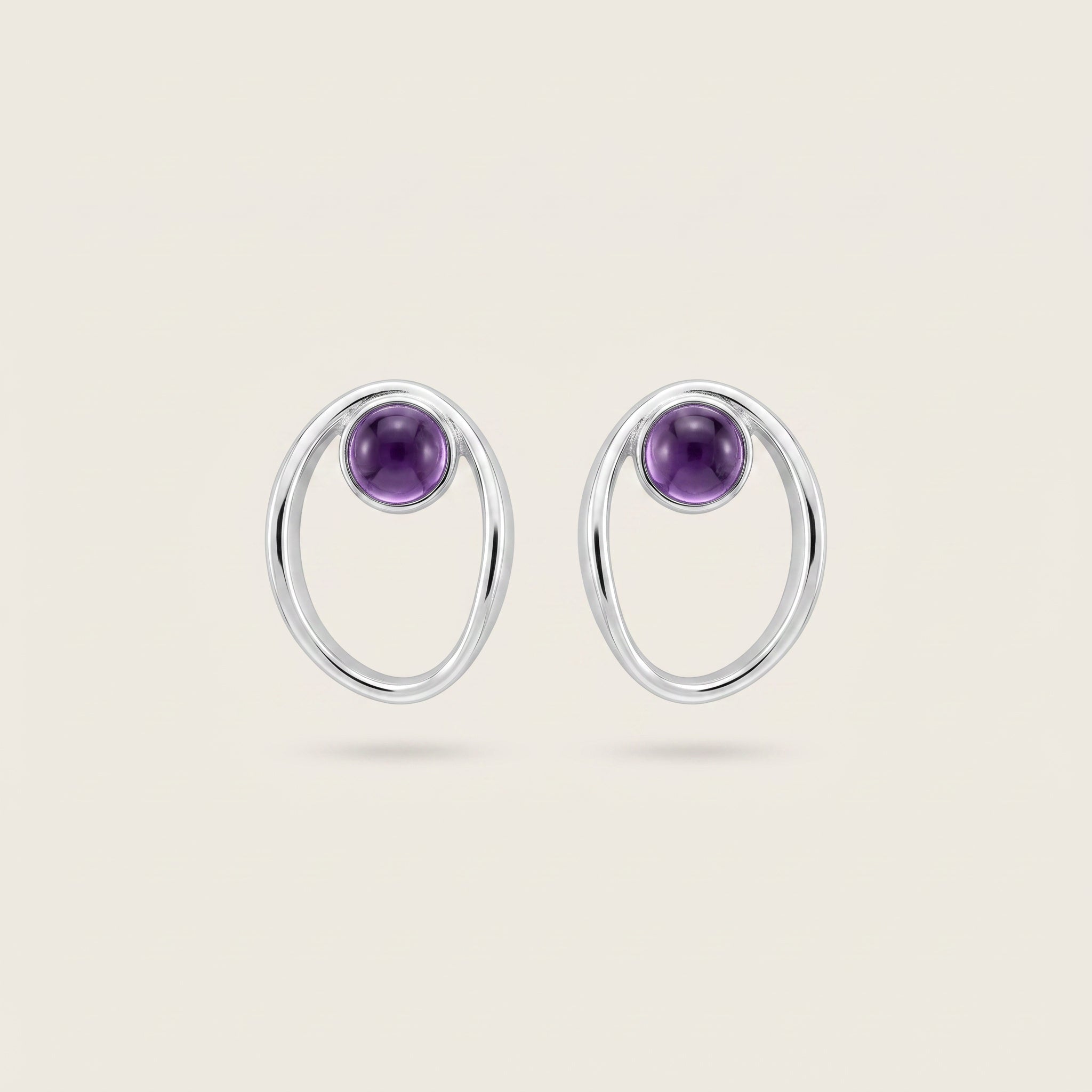 Purplee Store Pair of PIORELLE Sculpted Amethyst Earrings on a beige background