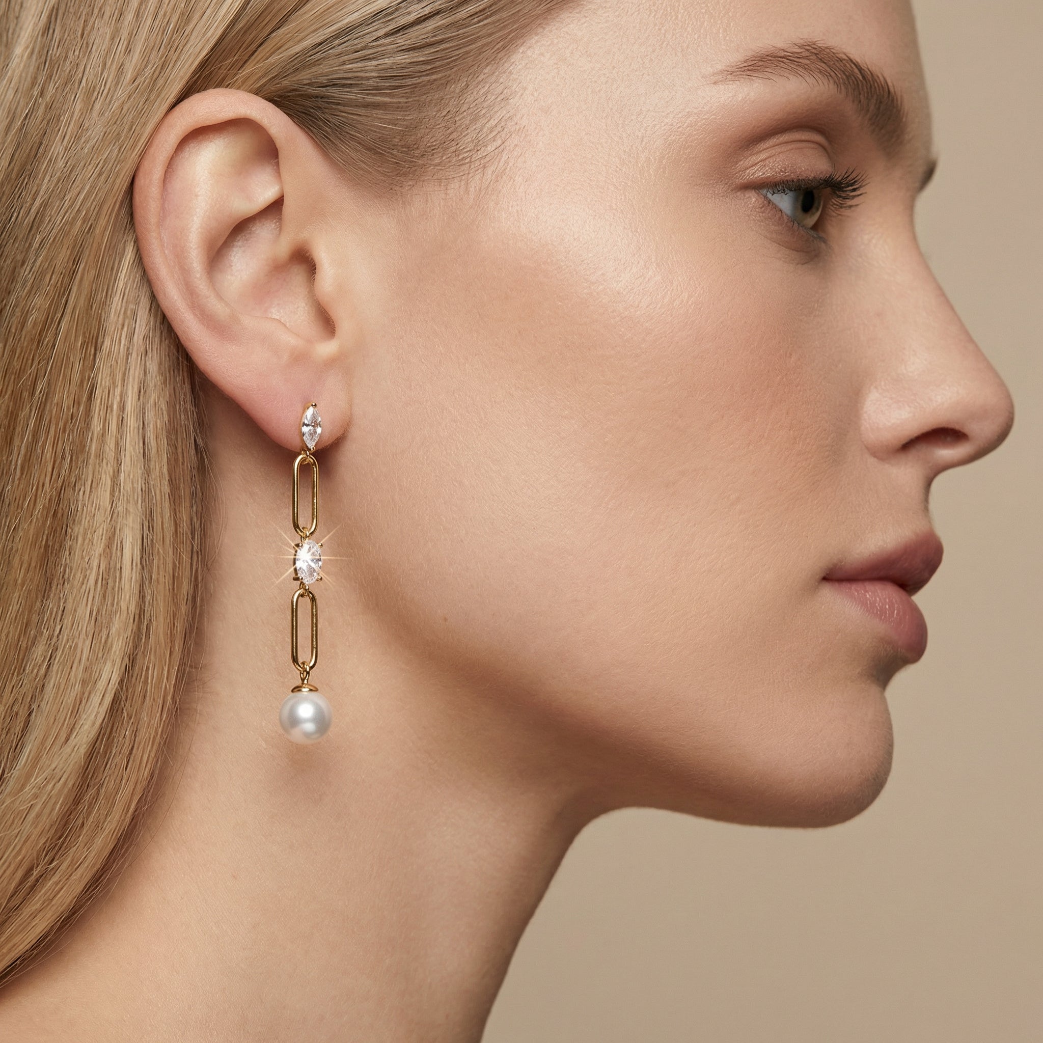 Woman using a Lumina Gemstone Link Gold Vermeil Earrings| Purplee Store
