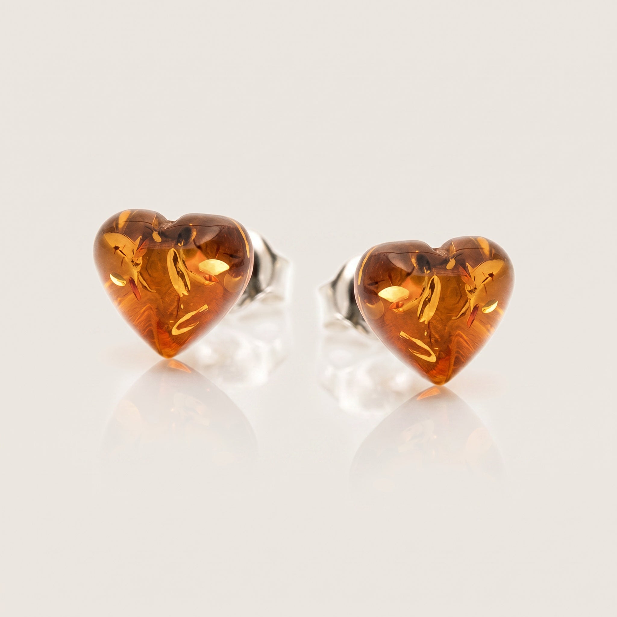 Amber Heart 925 Silver Studs|Purplee Store on a light gray background