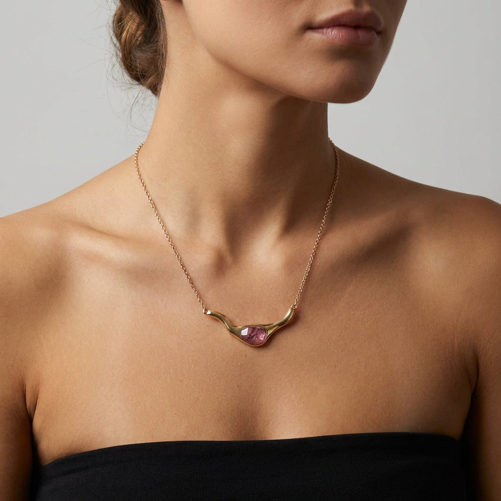 Woman waring a Purplee Store ICON Rhodonite Statement Necklace
