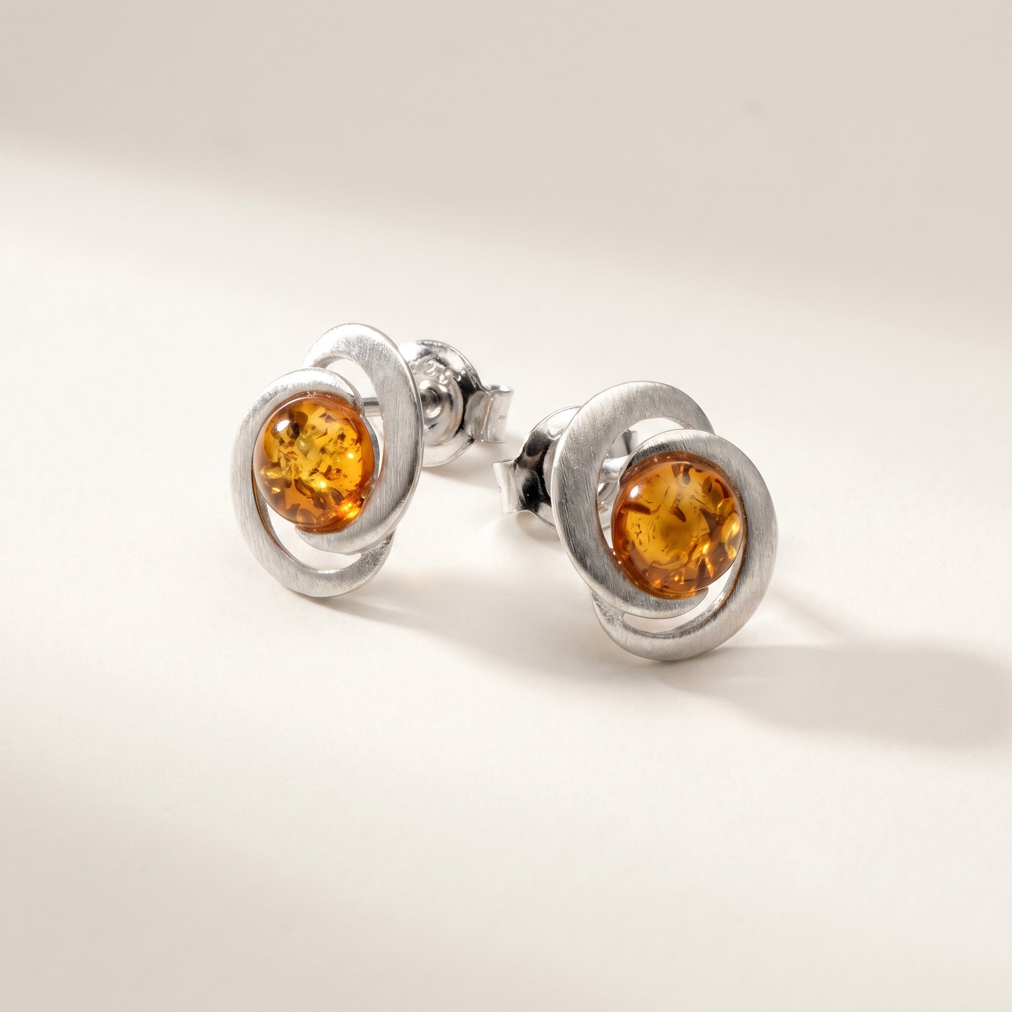 Pair of Amber Glow Round 925 Silver Drops|Purplee Store on a light background